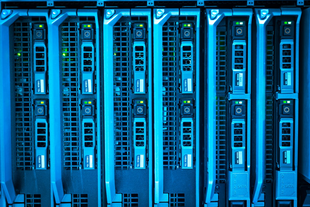 Detailed image of illuminated server racks showcasing modern technology infrastructure.